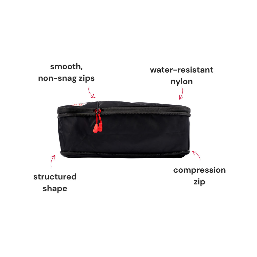Closed hae hae Ink packing cube showing its compression zip, non-snag zips, structured shape and water-resistant nylon