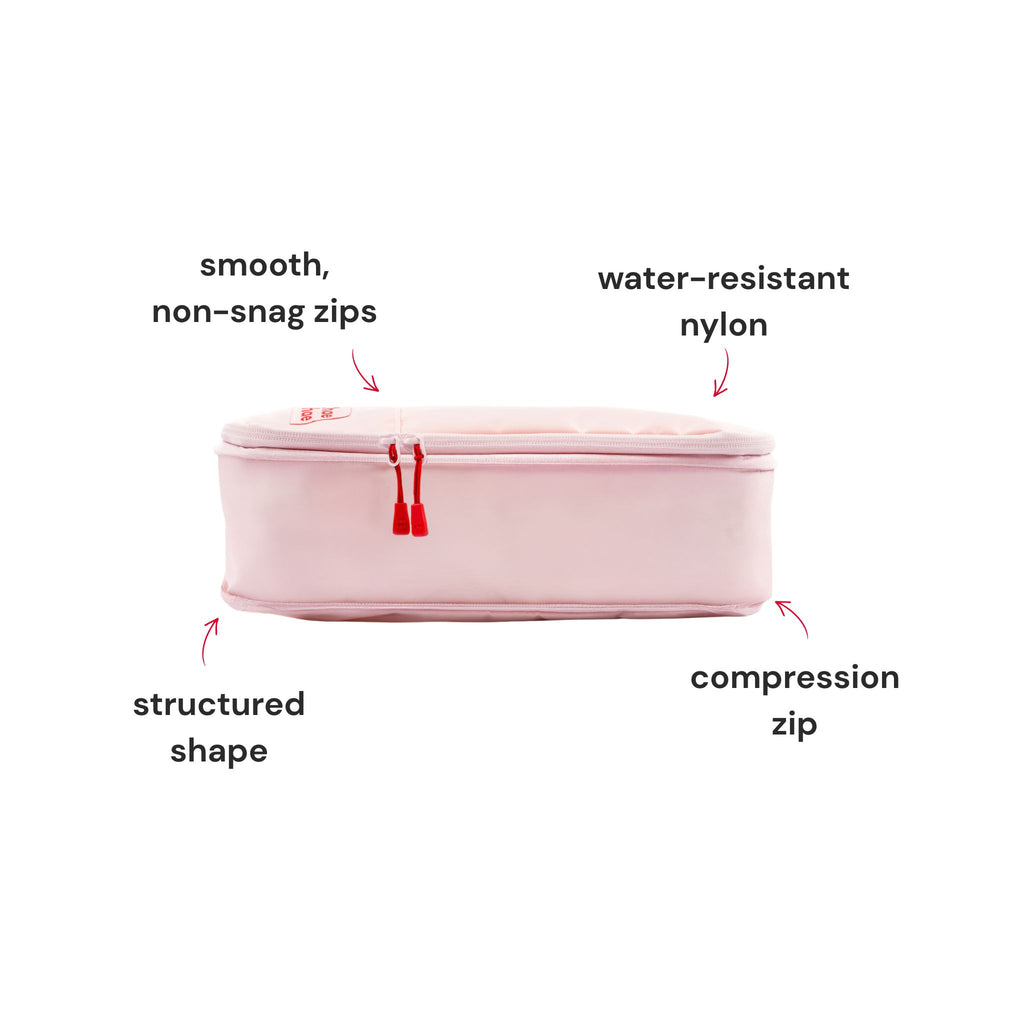 Closed hae hae blossom packing cube showing its compression zip, non-snag zips, structured shape and water-resistant nylon