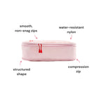 Closed hae hae blossom packing cube showing its compression zip, non-snag zips, structured shape and water-resistant nylon