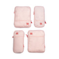 Set of four pink travel bags with 'hae hae' branding on a white background