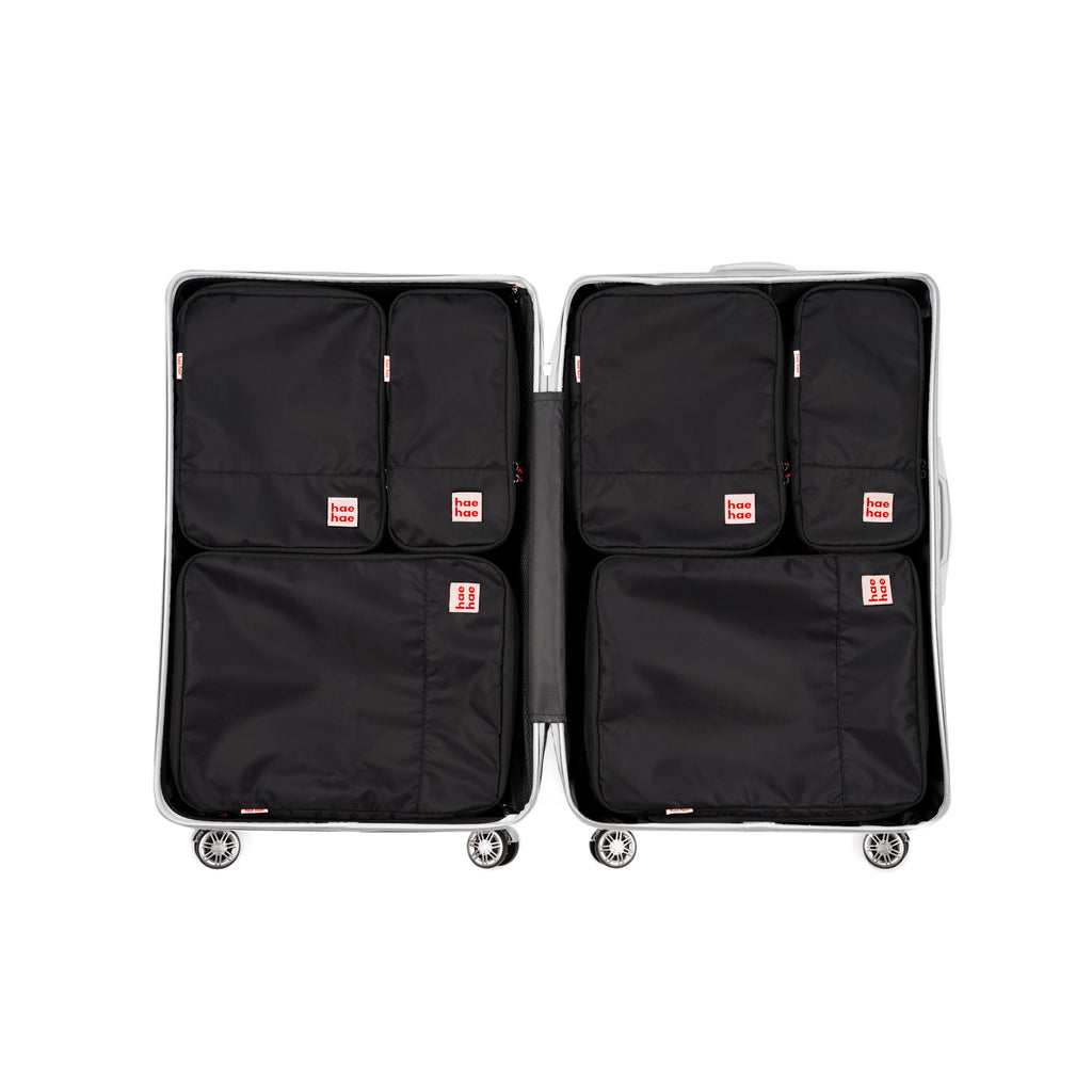 Large suitcase with 6 hae hae packing compression packing cubes in black ink