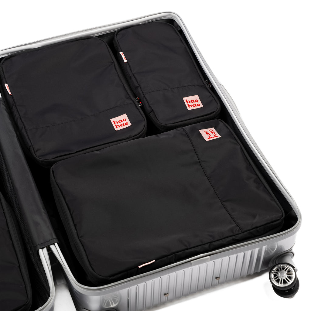 hae hae Ink compression packing cubes packed inside a cabin suitcase, 6 pack