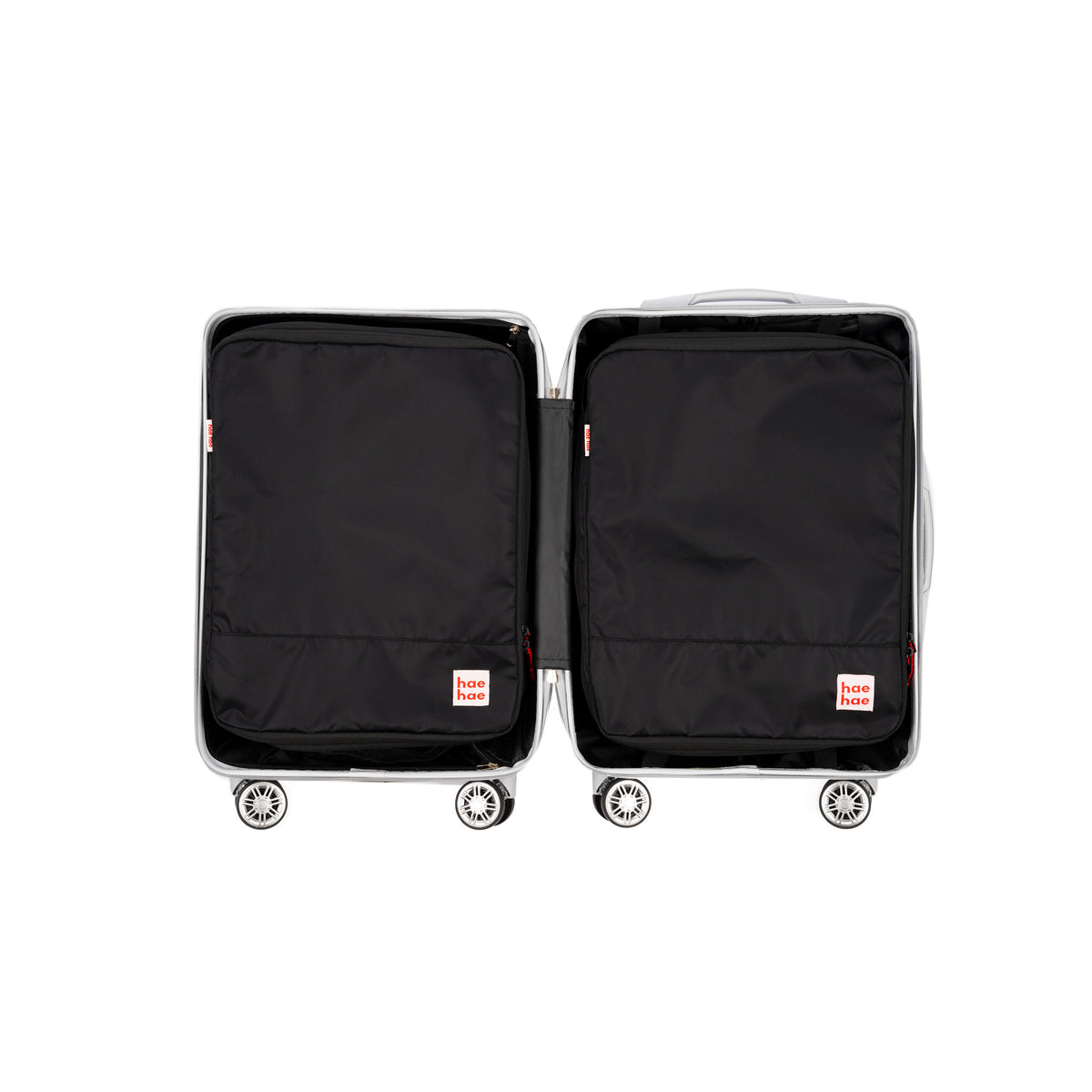 Two large compression packing cubes in a small carry on case, hae hae