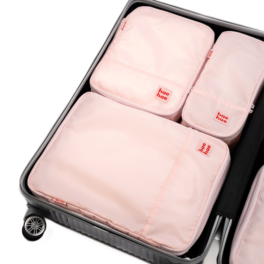 hae hae Blossom compression packing cubes packed inside a cabin suitcase, 6 pack
