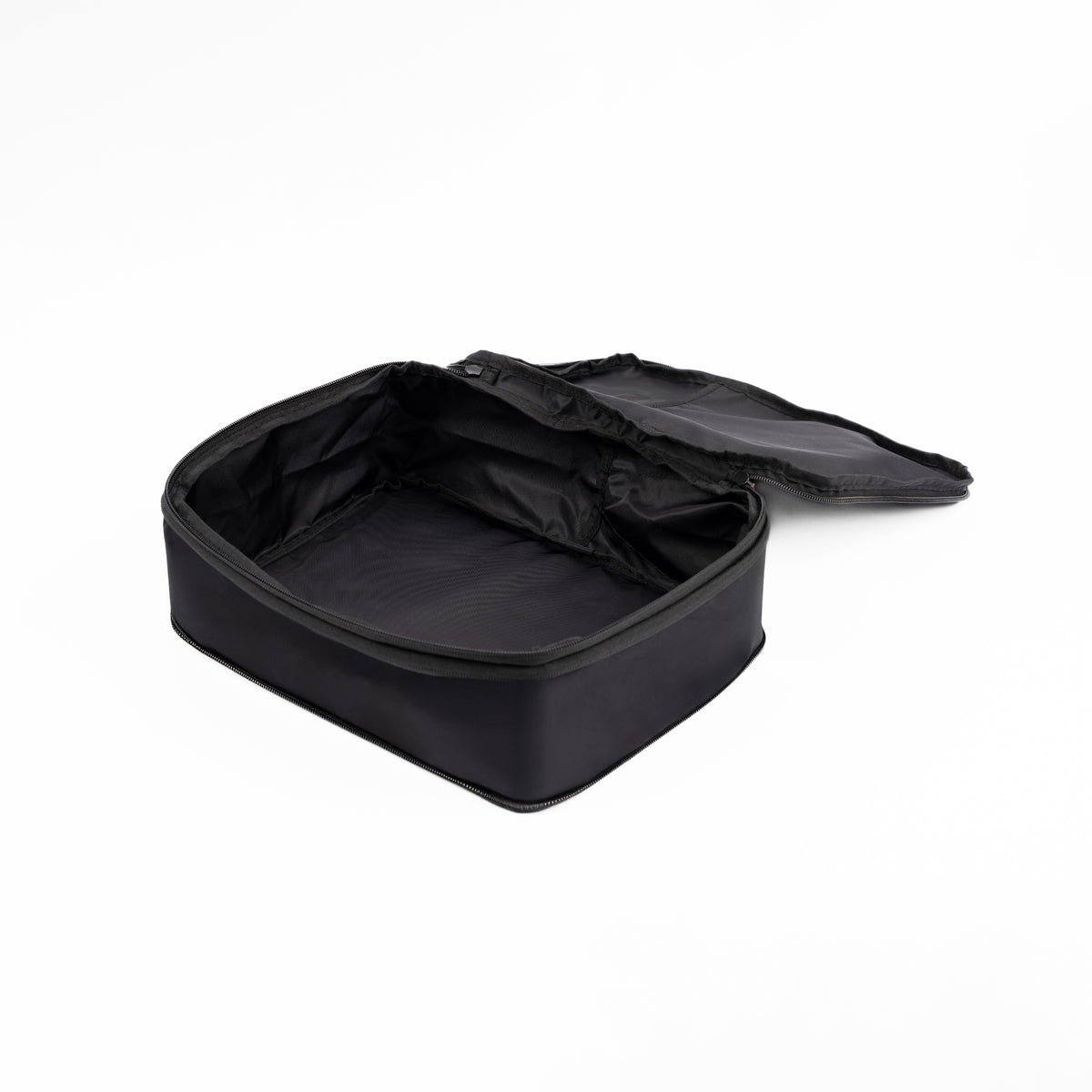 open black compression packing cube from hae hae, walls standing up themselves