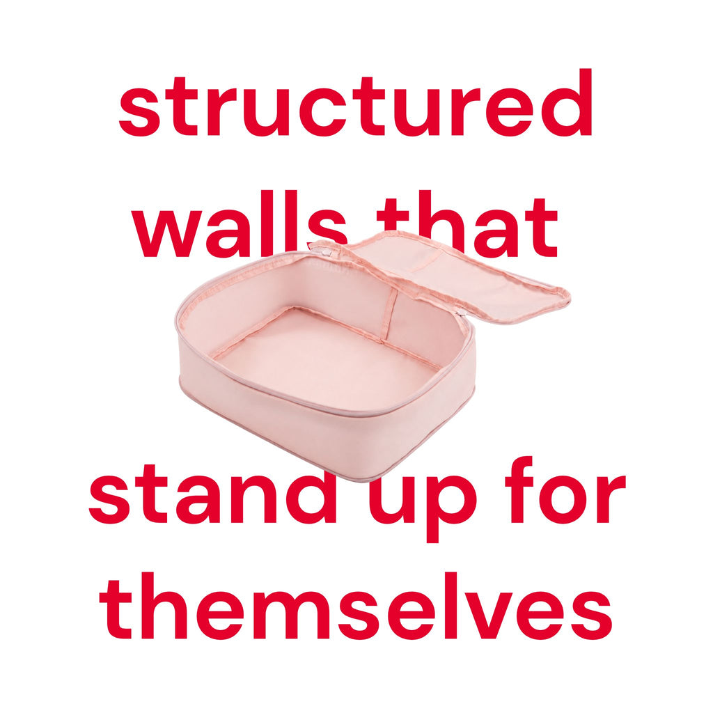 Open hae hae Blossom packing cube with structured walls standing upright while ready to pack